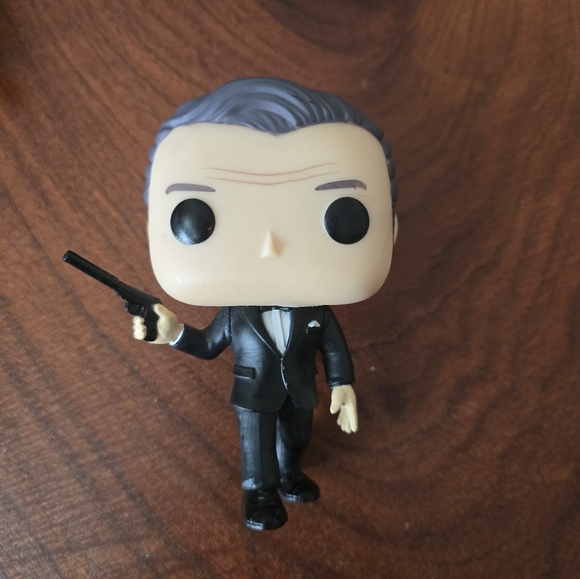 Funko Pop Figures with Black, Gray, and Cream Outfits From James Bond Movies - Picture 4 of 6